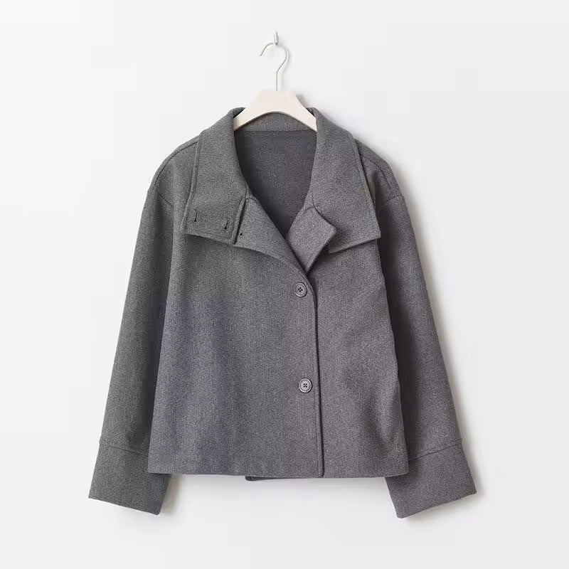 Women's oversized short coat with high neckline, long sleeves and button front