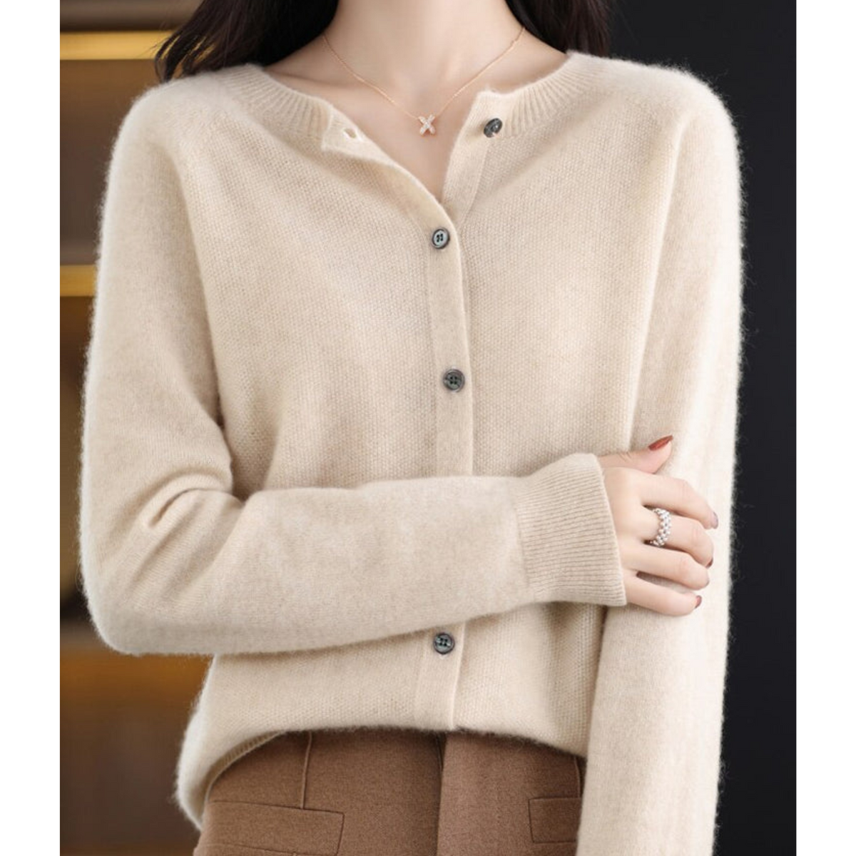 Women's long-sleeve round-neck button-front cardigan with ribbed trim
