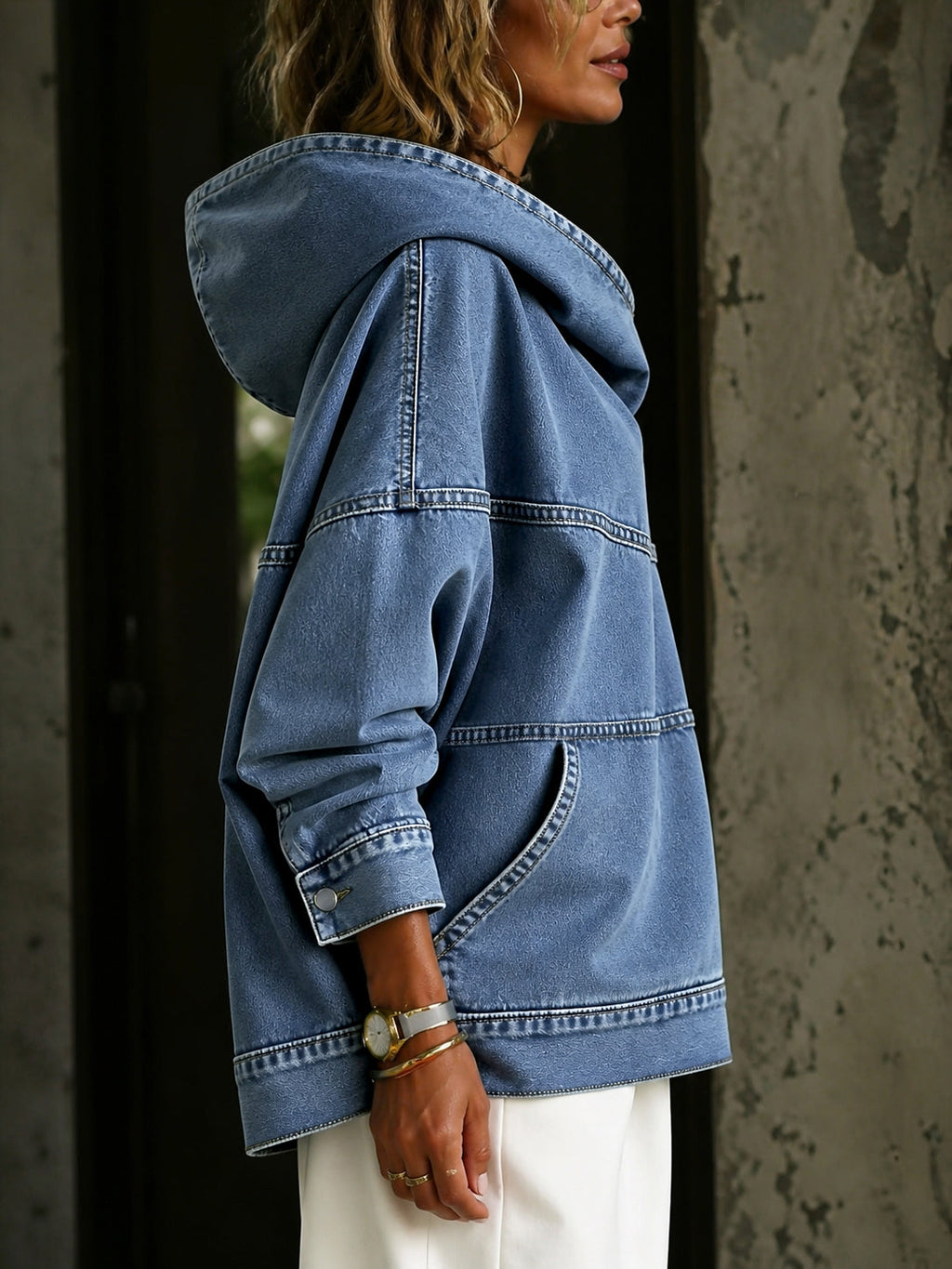 Women's blue hooded pullover with panelled seams and kangaroo pocket
