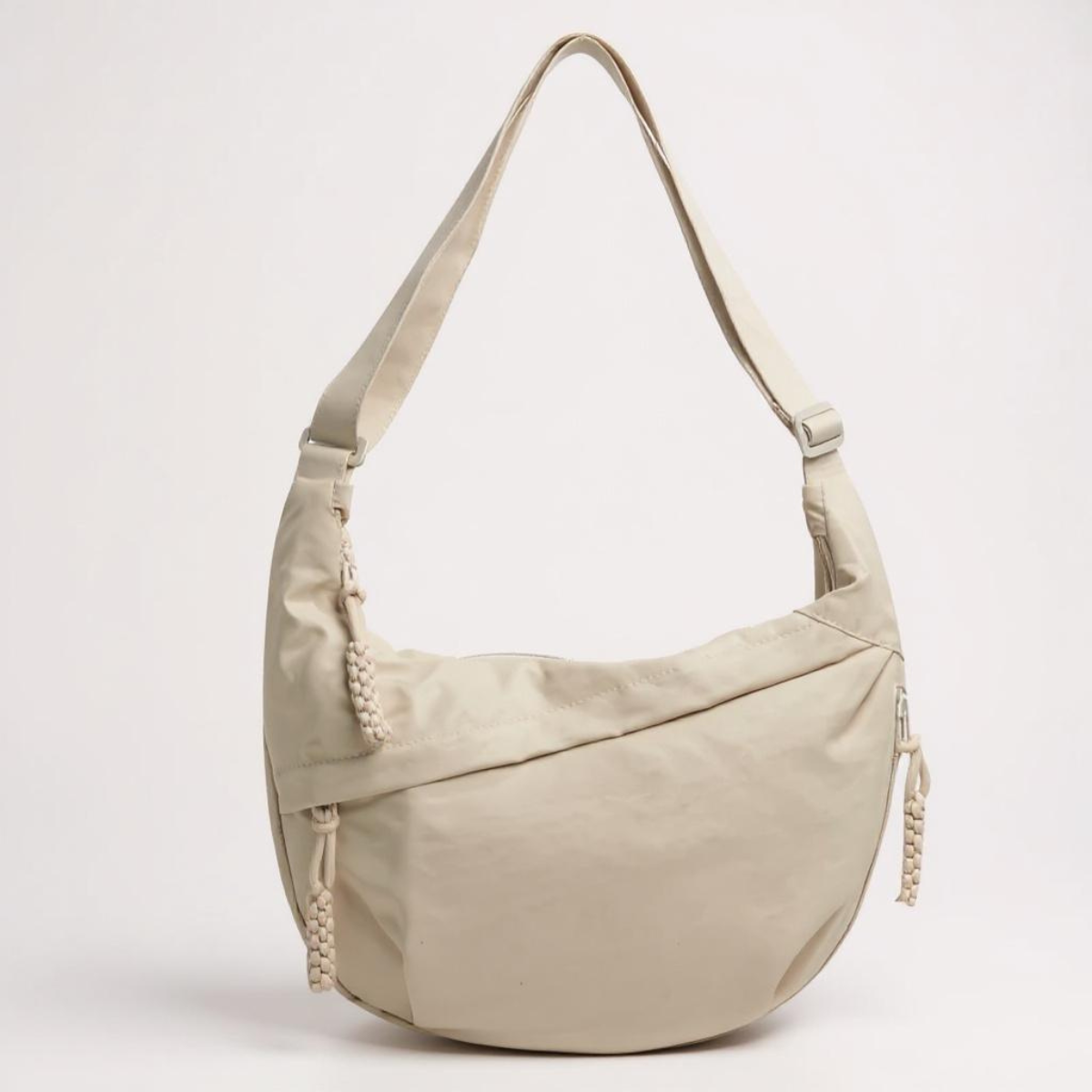 Sac bandoulière demi-lune sportif pour femme