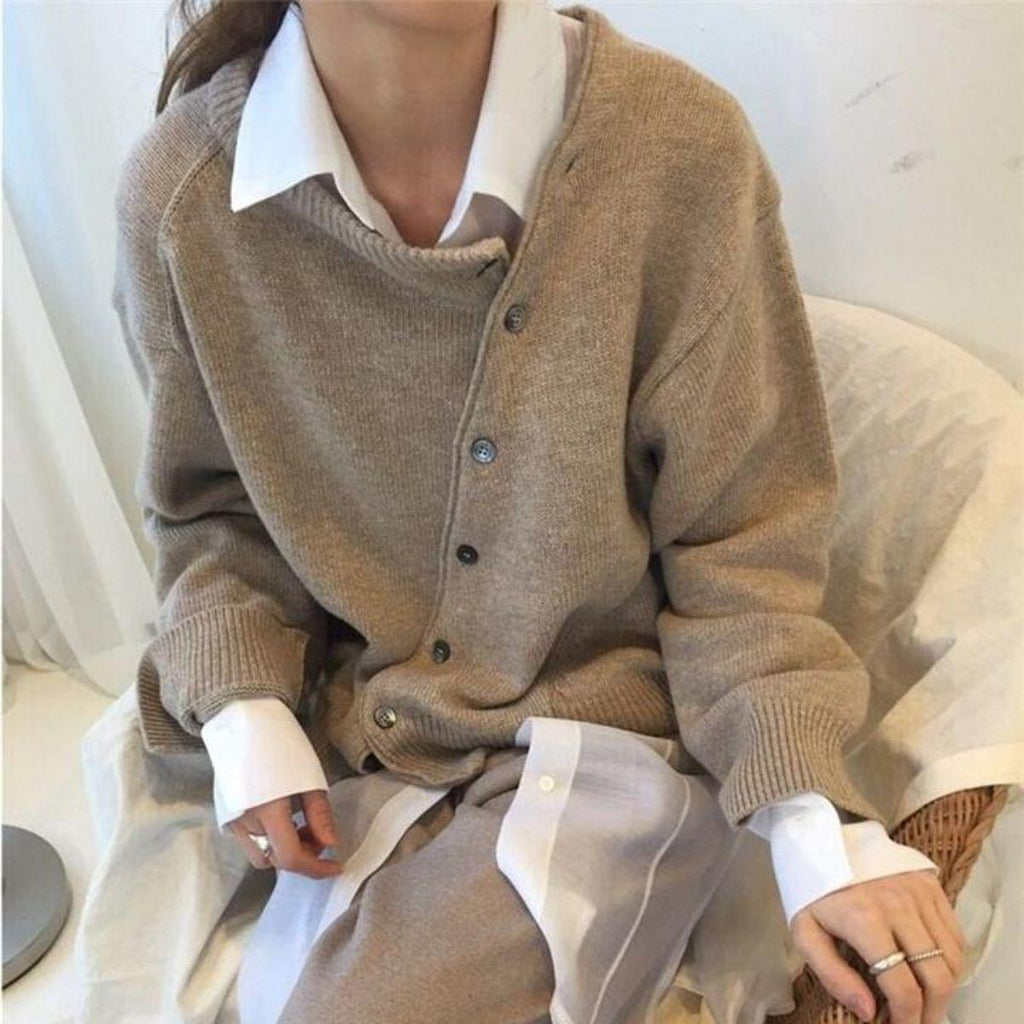 Women's oversized knit cardigan with asymmetric button front and long sleeves
