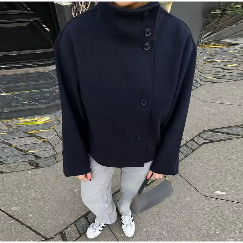 Women's oversized short coat with high neckline, long sleeves and button front