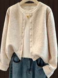 Gilet en maille classique pour femme à col rond et boutonnage