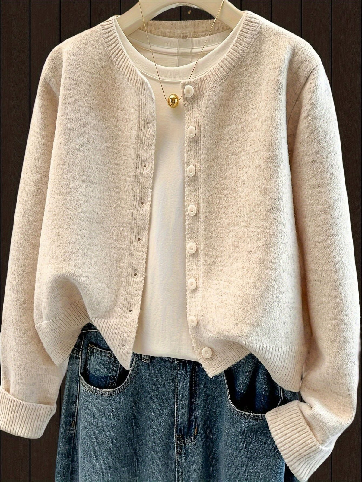 Gilet en maille classique pour femme à col rond et boutonnage