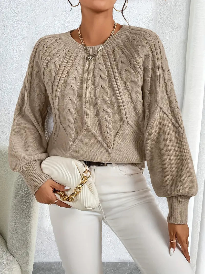 Women's beige cable knit cropped sweater with crew neck and long lantern sleeves