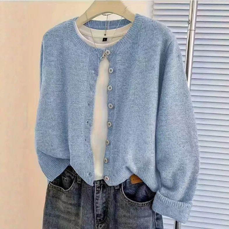 Gilet en maille classique pour femme à col rond et boutonnage