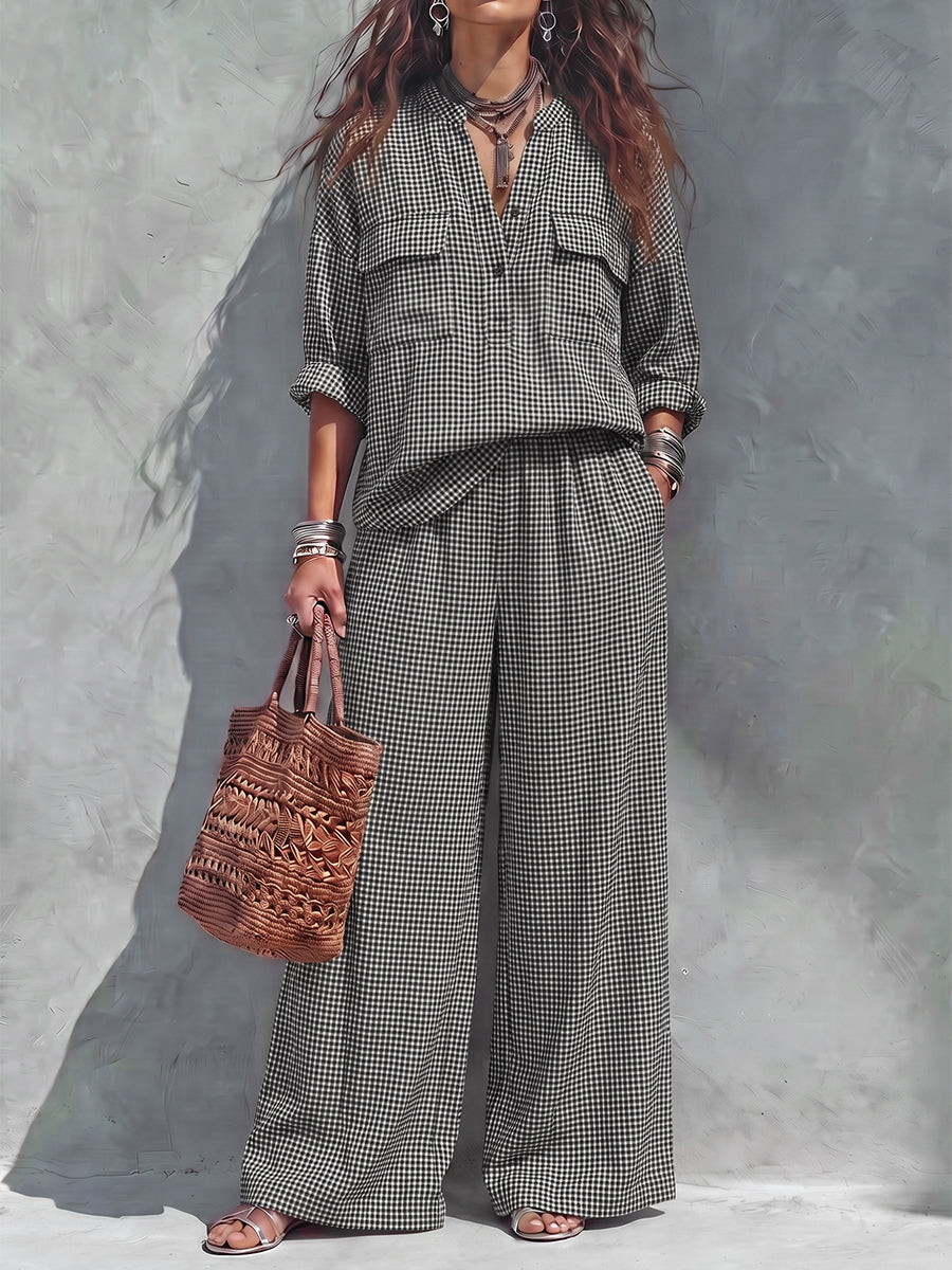 Women's black and white checked wide leg trousers with elastic waist and side pockets