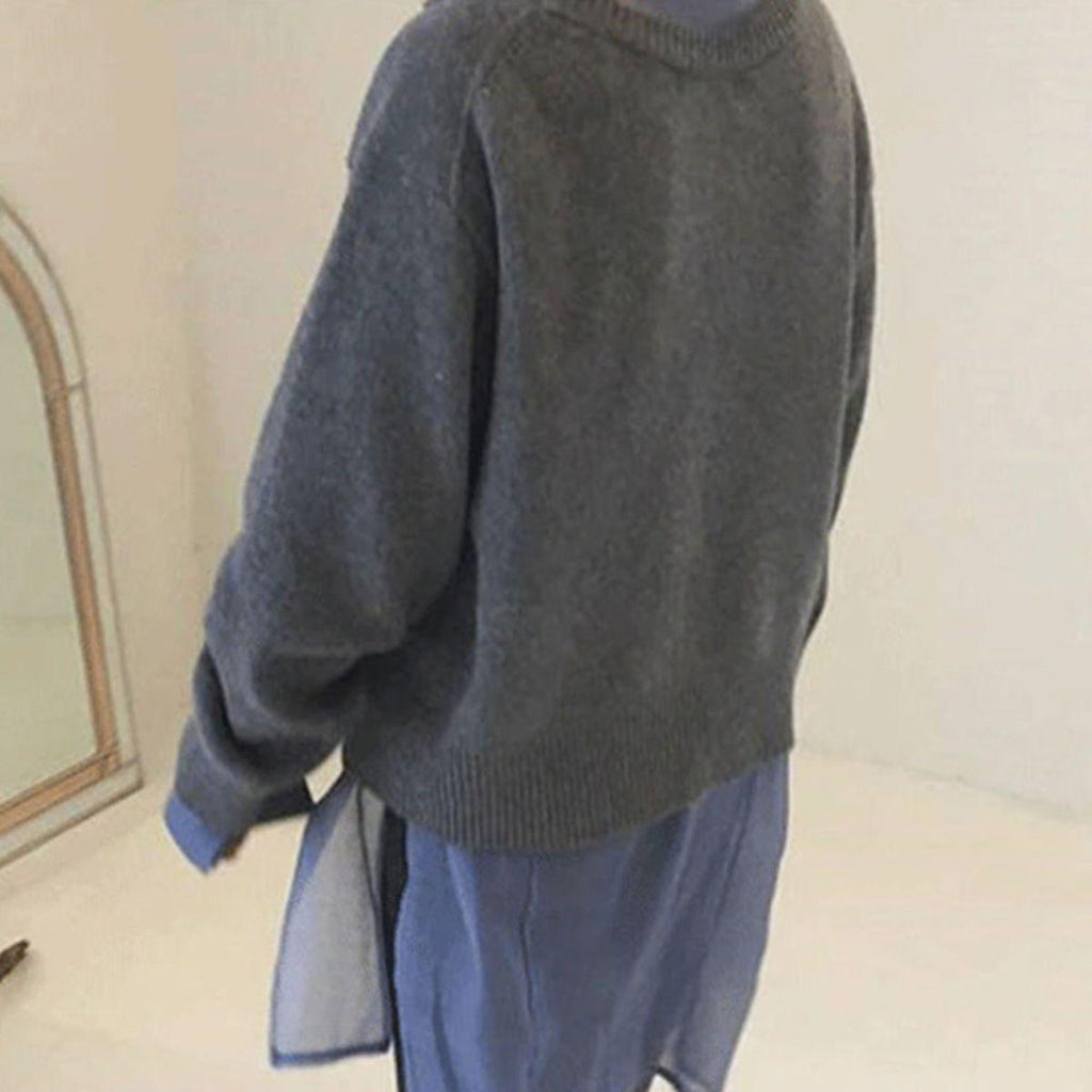 Women's oversized knit cardigan with asymmetric button front and long sleeves