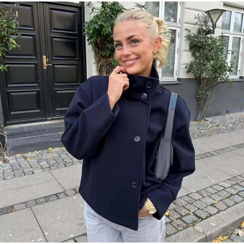 Women's oversized short coat with high neckline, long sleeves and button front