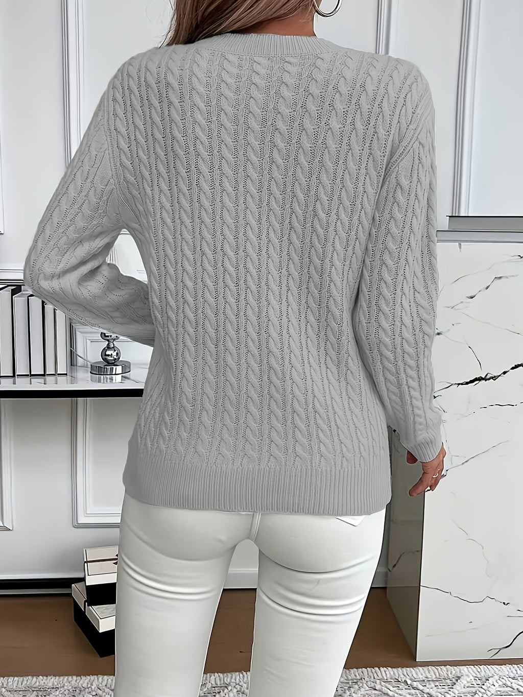 Pull classique pour femme en maille torsadée, à col montant