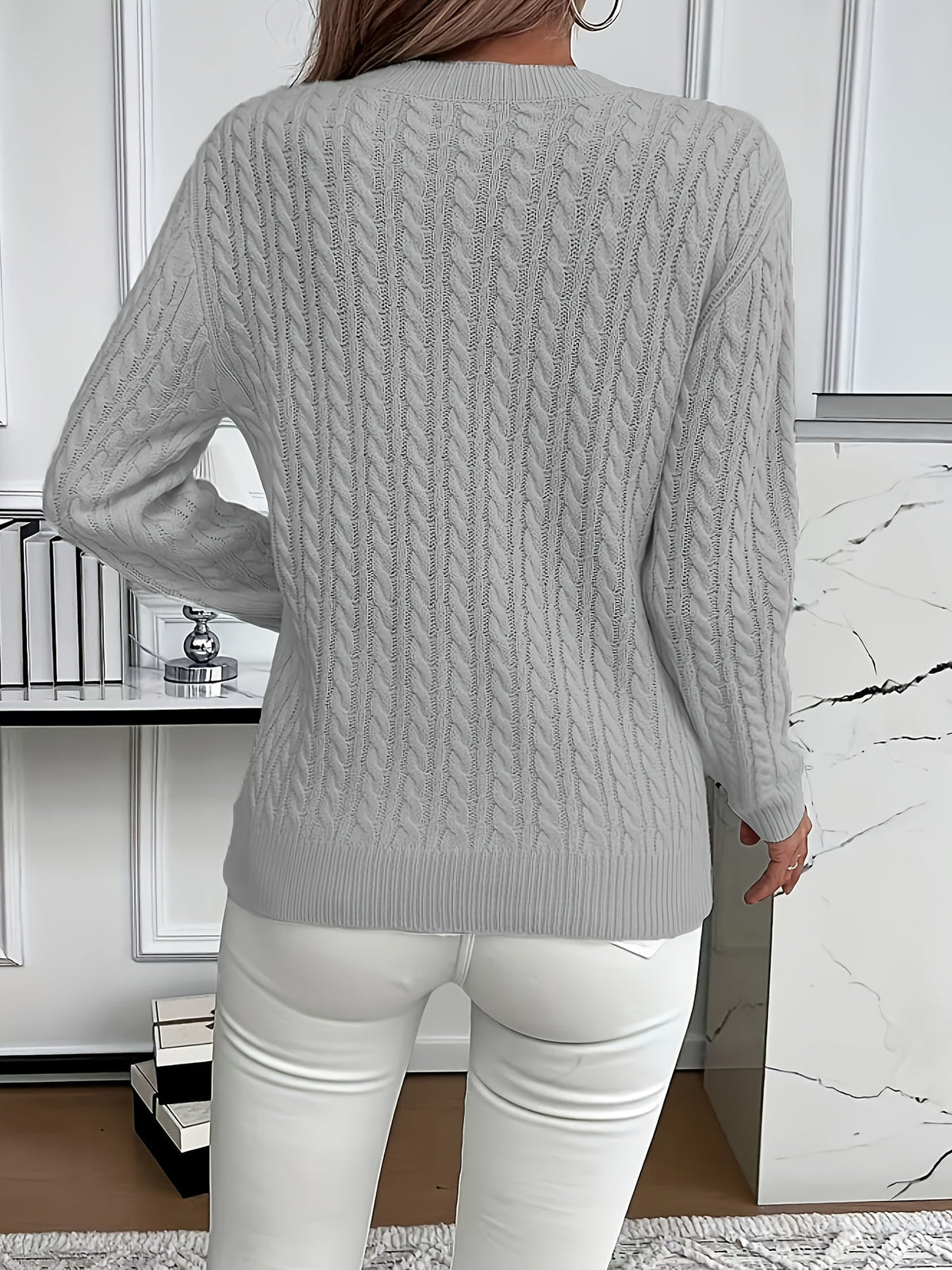 Pull classique pour femme en maille torsadée, à col montant