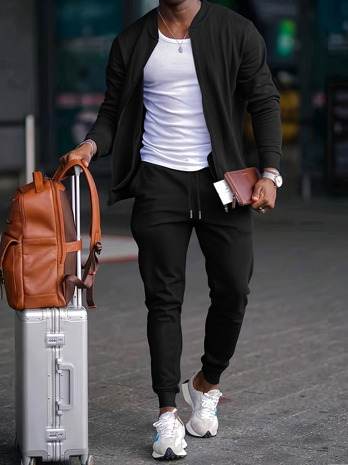 Men's zip-up bomber jacket and tapered jogger tracksuit set