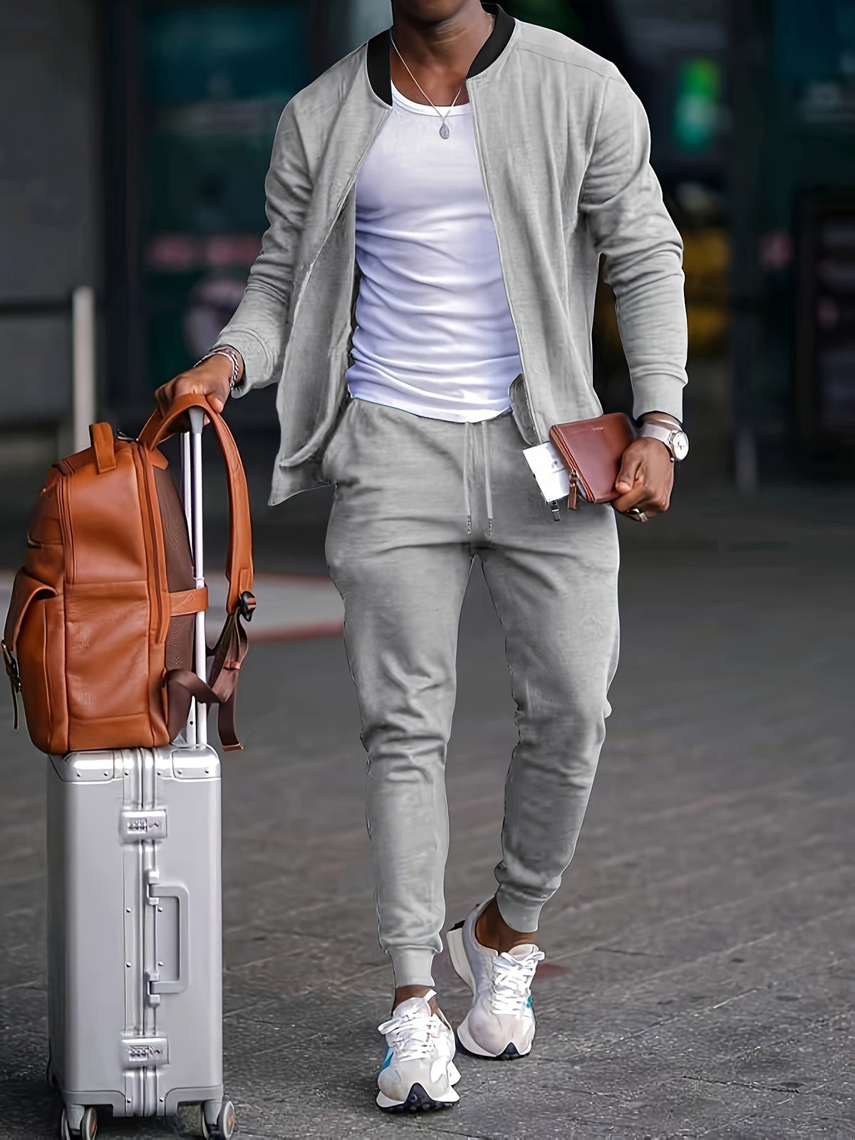 Men's zip-up bomber jacket and tapered jogger tracksuit set