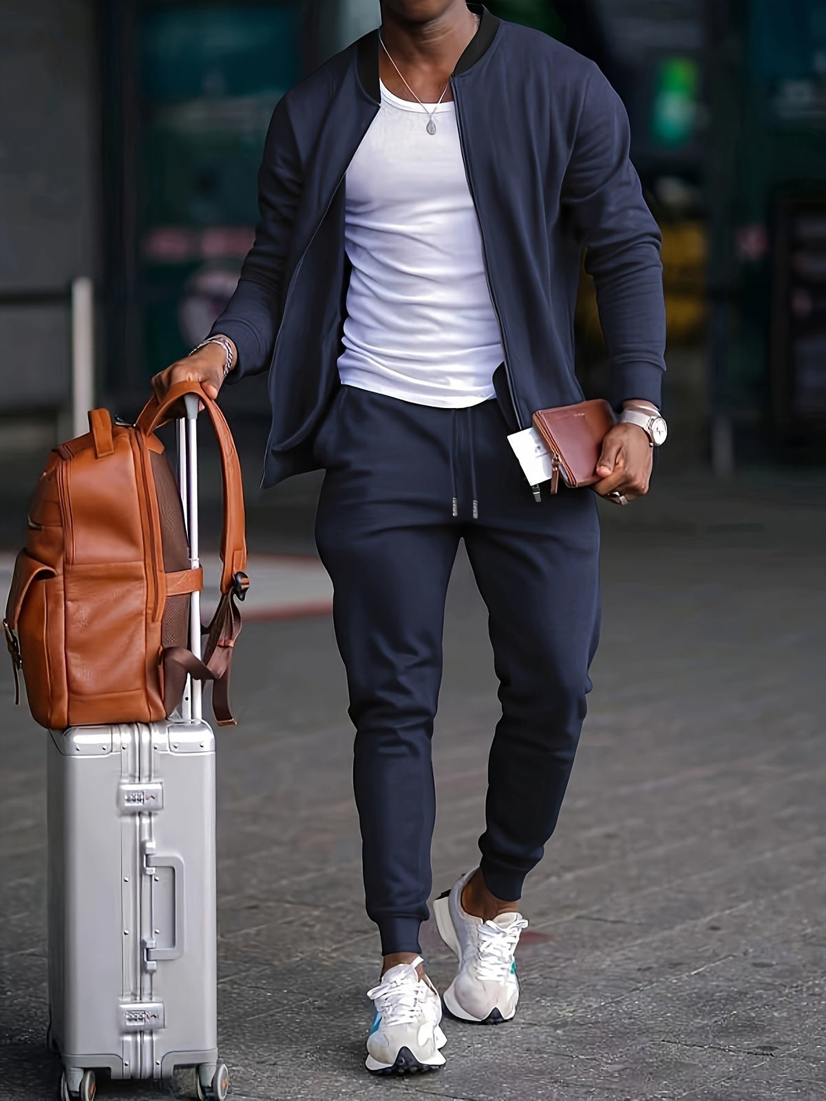 Men's zip-up bomber jacket and tapered jogger tracksuit set