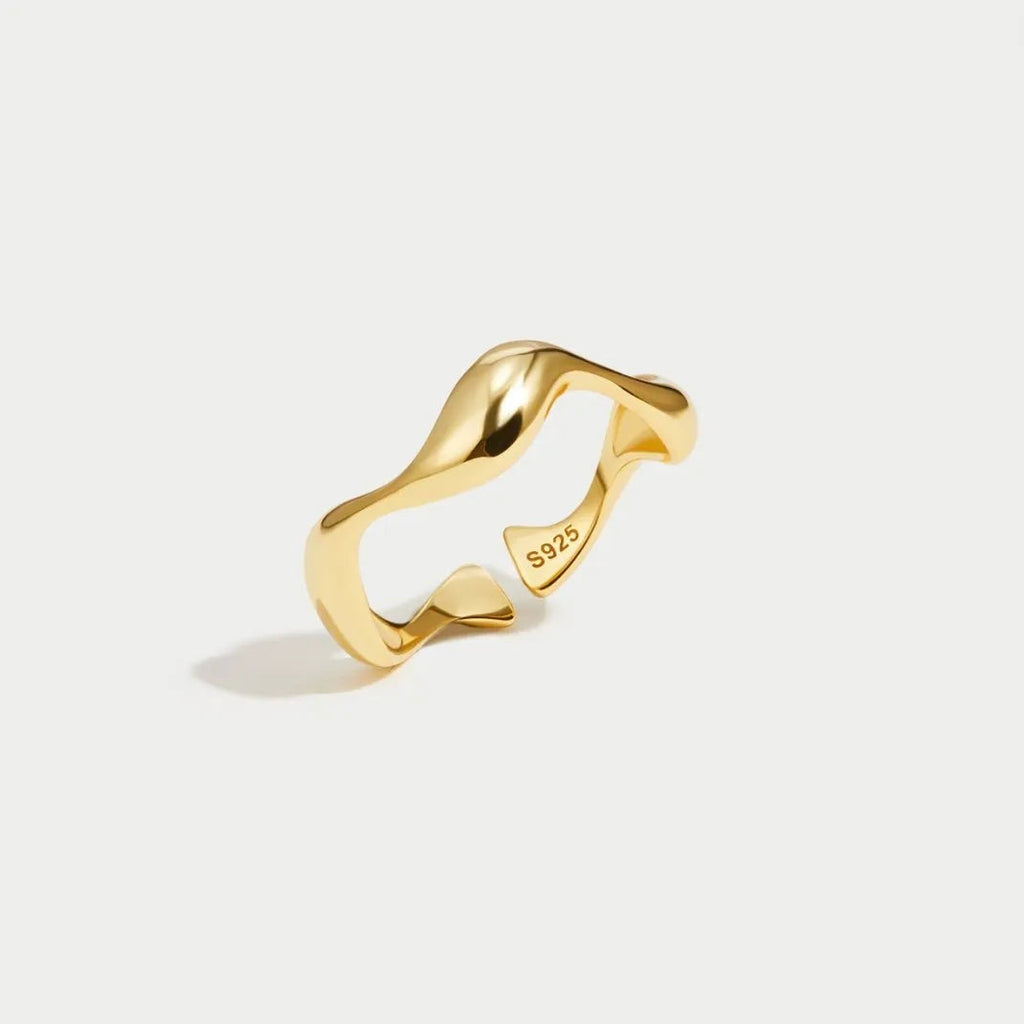 Bague ouverte sculpturale en forme de vague torsadée