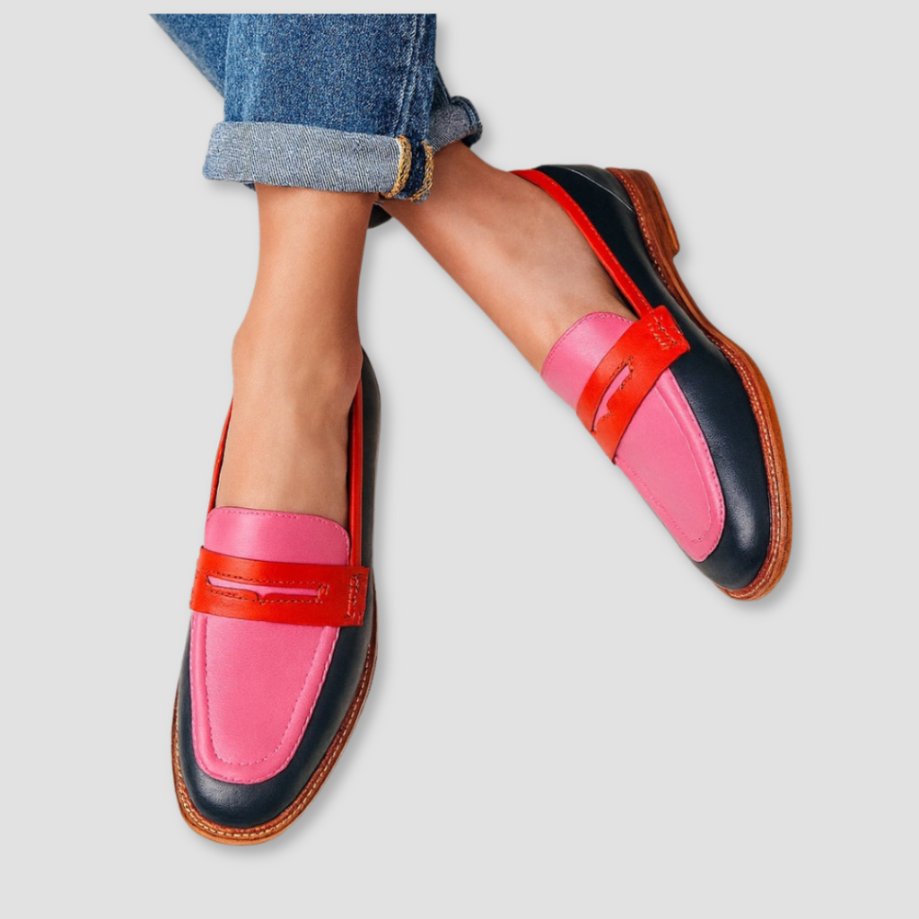 Women's color-block penny loafers with navy, pink and red panels and low heels