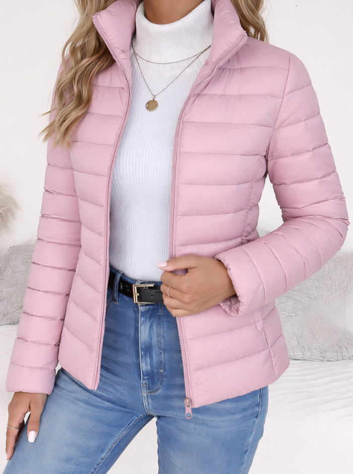 Women's quilted funnel neck puffer jacket with long sleeves and front zipper