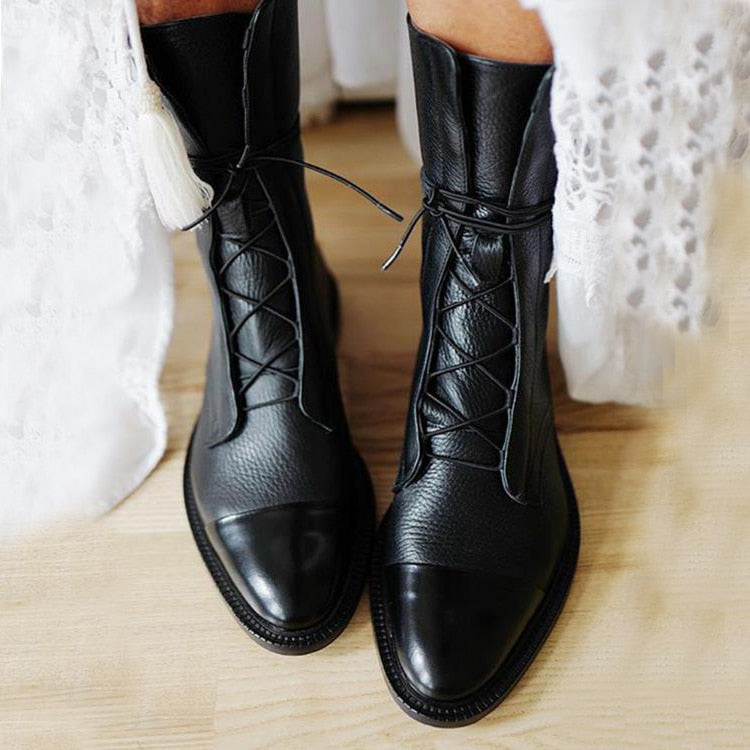 Women's knee-high lace-up boots with panelled toe caps