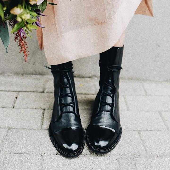 Women's knee-high lace-up boots with panelled toe caps