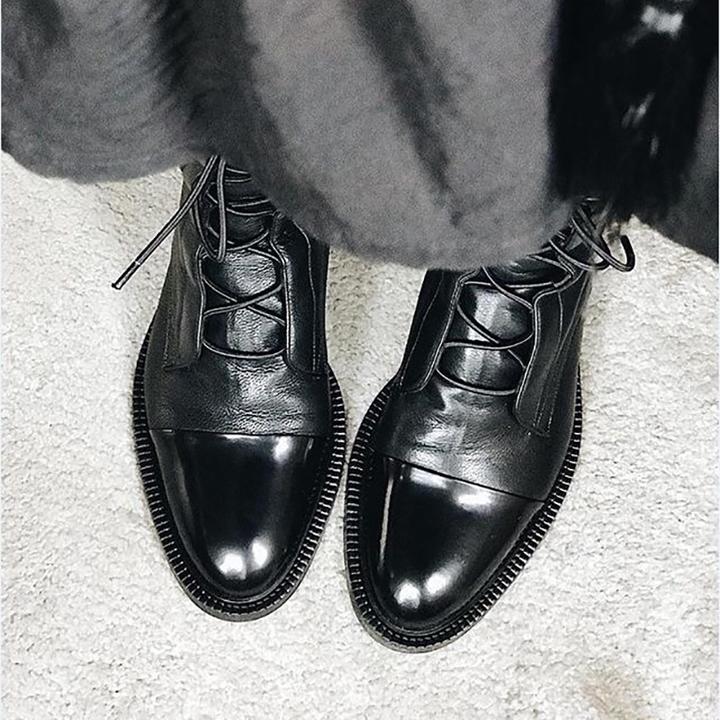 Women's knee-high lace-up boots with panelled toe caps