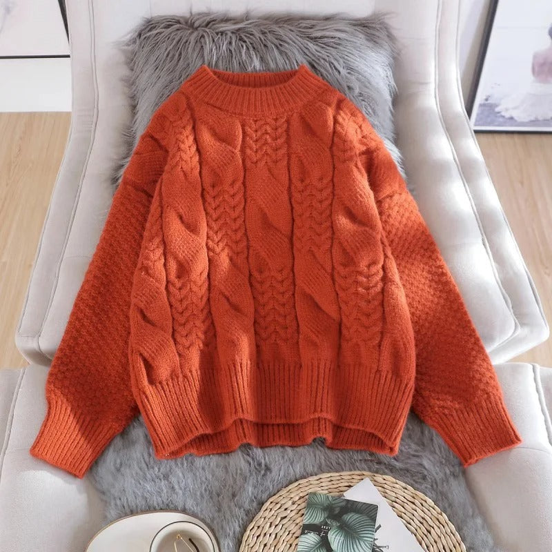 Women's oversized cable knit mock neck sweater with long sleeves and ribbed trims