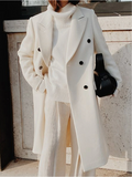 Manteau long ajusté croisé à double boutonnage pour femme