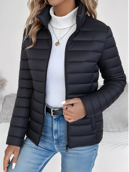 Women's quilted funnel neck puffer jacket with long sleeves and front zipper