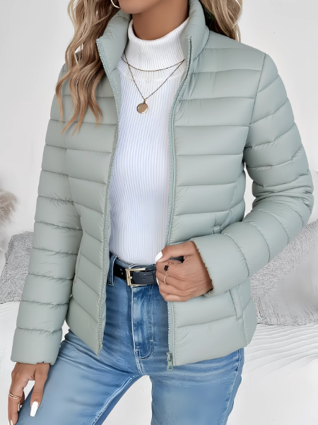 Women's quilted funnel neck puffer jacket with long sleeves and front zipper