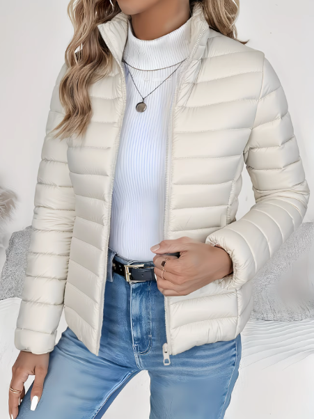 Women's quilted funnel neck puffer jacket with long sleeves and front zipper