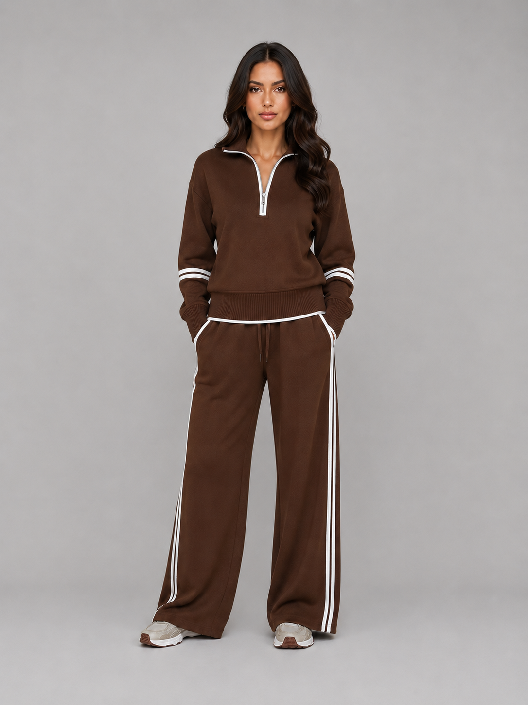 Women's striped half-zip sweatshirt and wide-leg pants set with contrast piping
