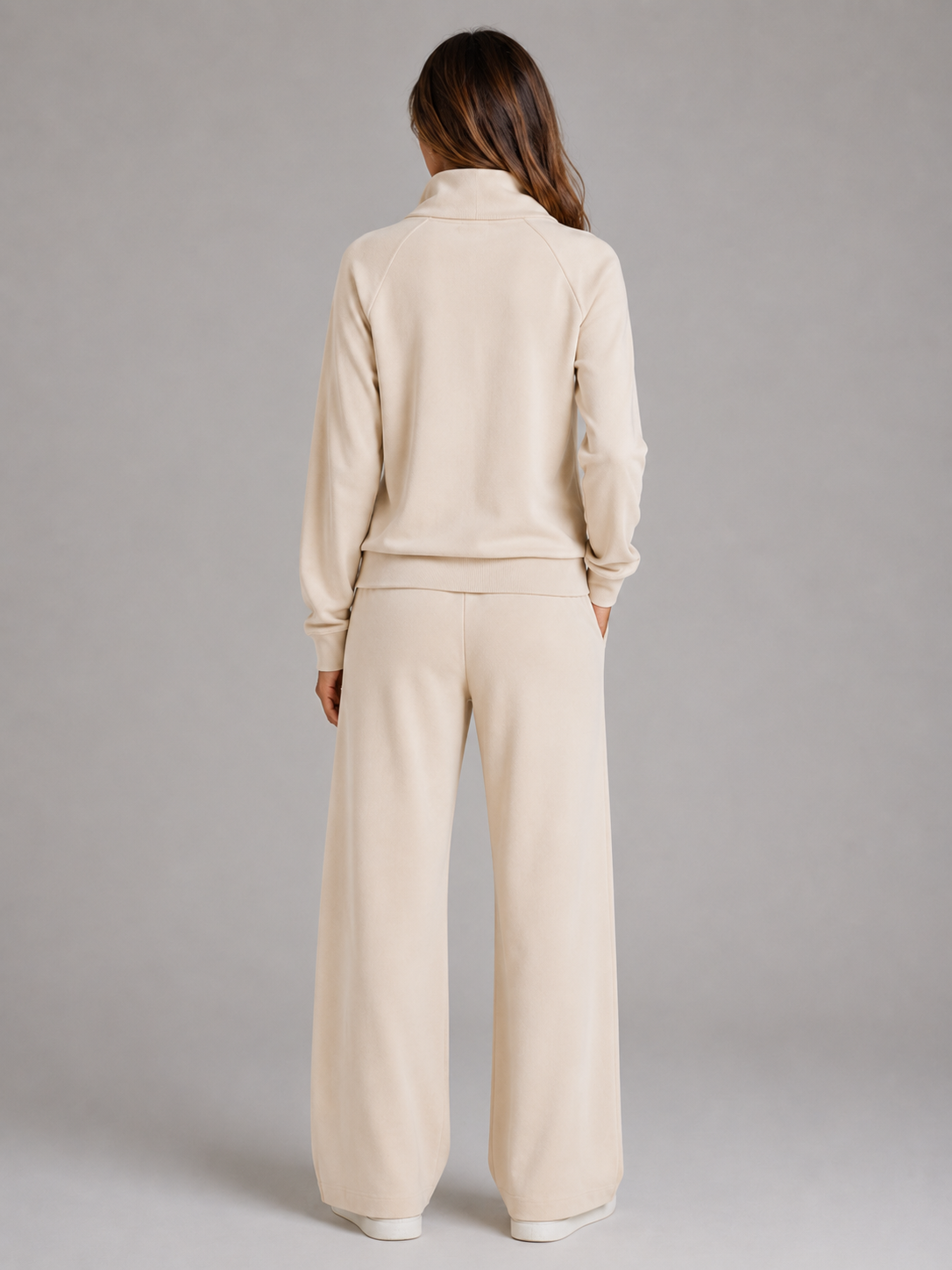 Women's quarter-zip sweatshirt and wide-leg joggers set with raised collar and drawstring waist