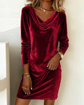 Women's cowl neck mini dress with long sleeves and ruched skirt detail