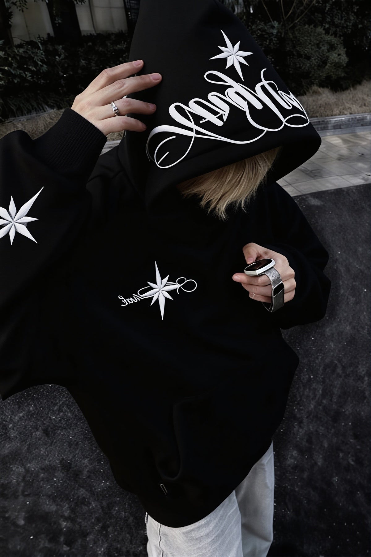 Pullover hoodie with embroidered star script, hood, long sleeves and front pouch pocket