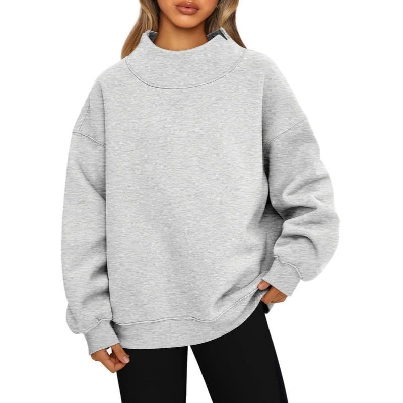Women's oversized mock neck sweatshirt with long sleeves and ribbed trim