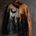 Women's color block sweater with cat motifs, distressed edges and stitched panel details