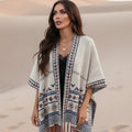 Gilet kimono bohème en maille à motifs géométriques et pompons pour femme
