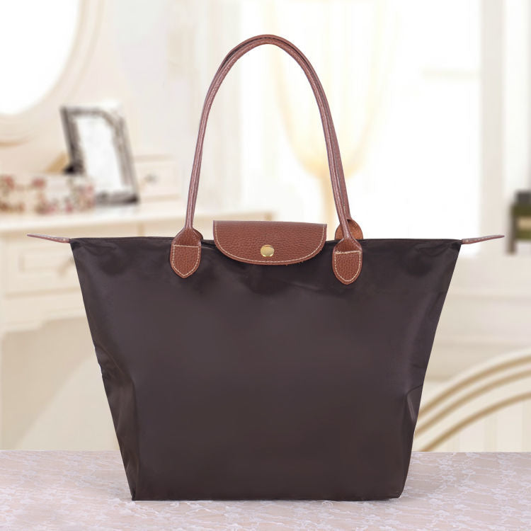 Sac cabas pliable en nylon avec bordure en cuir