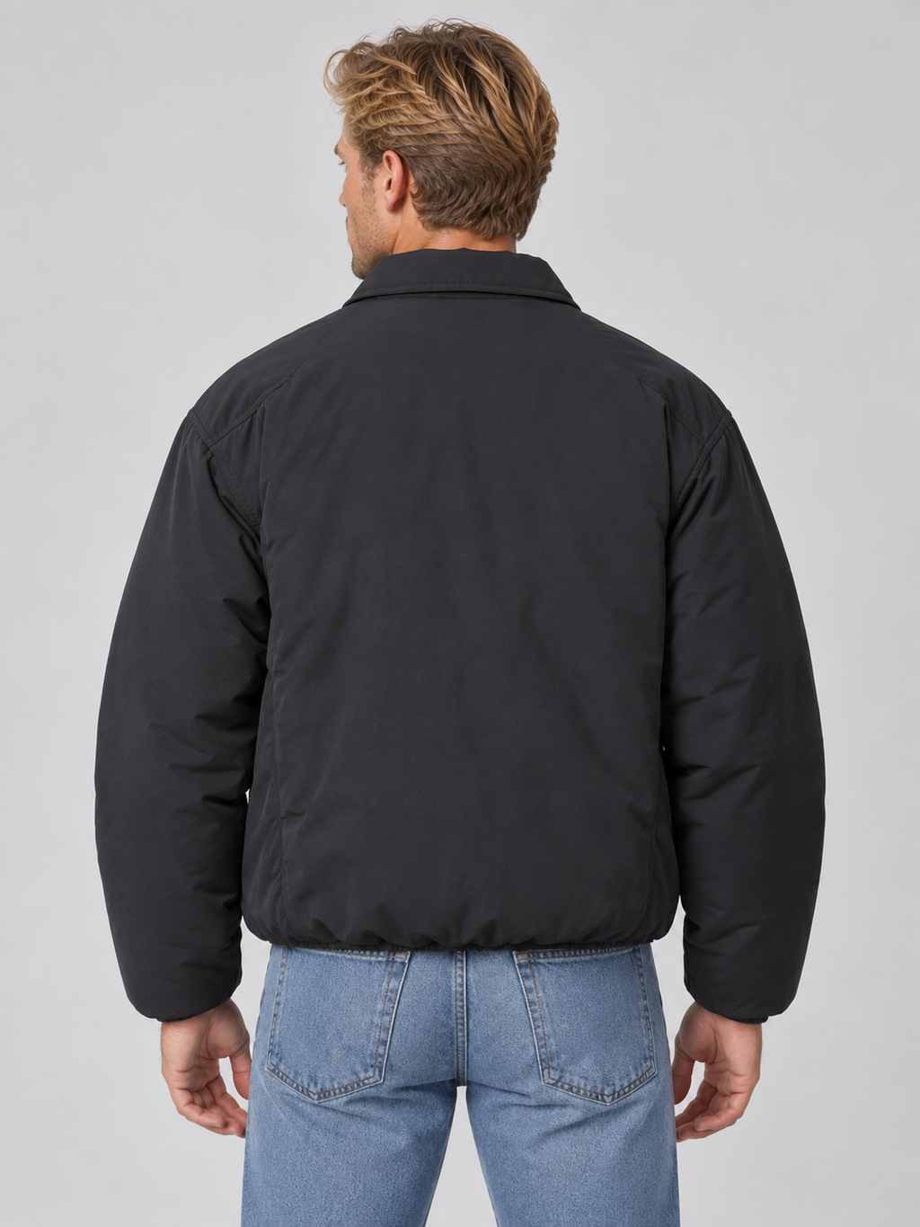 Men's padded collared bomber jacket with zip front and angled pockets