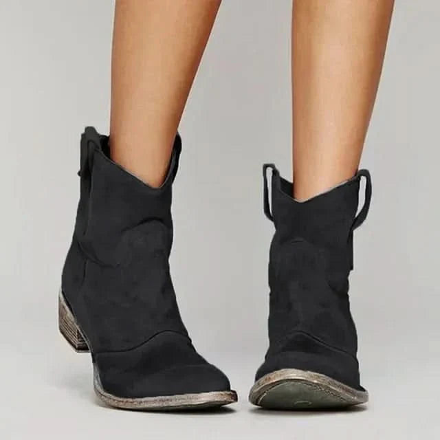 Women's vintage western ankle boots with pointed toes, pull tabs and low stacked heels