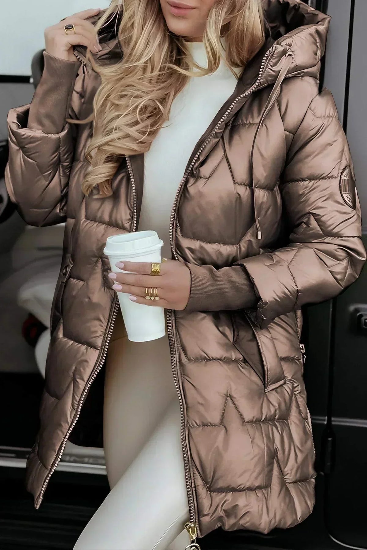 Women's hooded longline puffer jacket with glossy geometric quilting