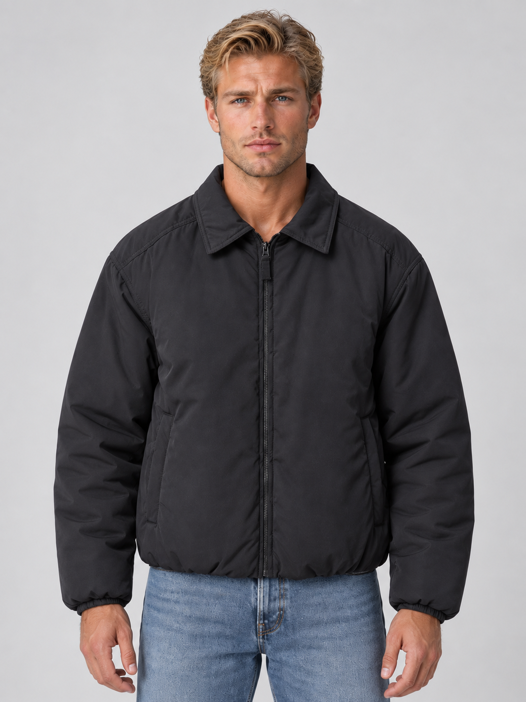 Men's padded collared bomber jacket with zip front and angled pockets