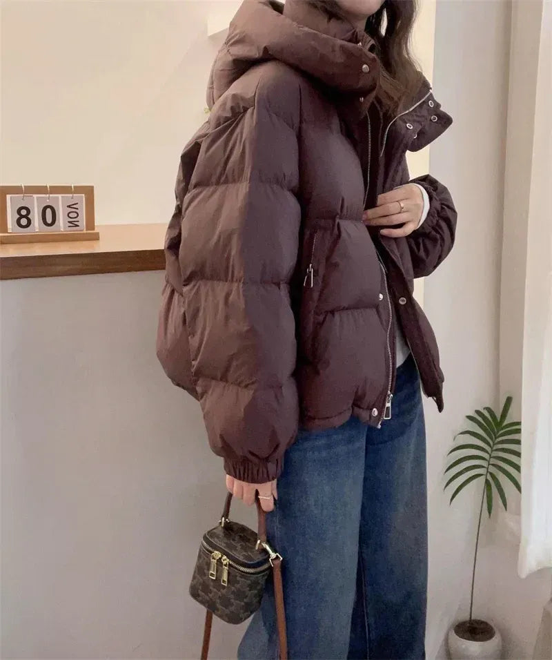 Women's cropped quilted puffer jacket with hood, long sleeves and zip front