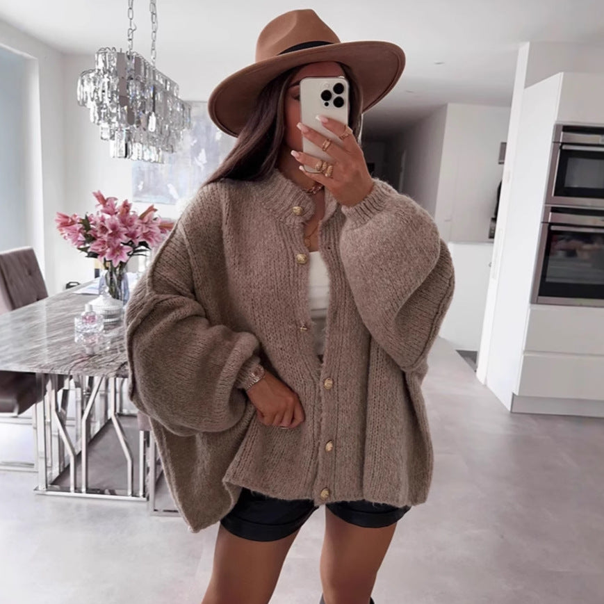 Women's oversized chunky knit cardigan with long sleeves and gold-tone buttons