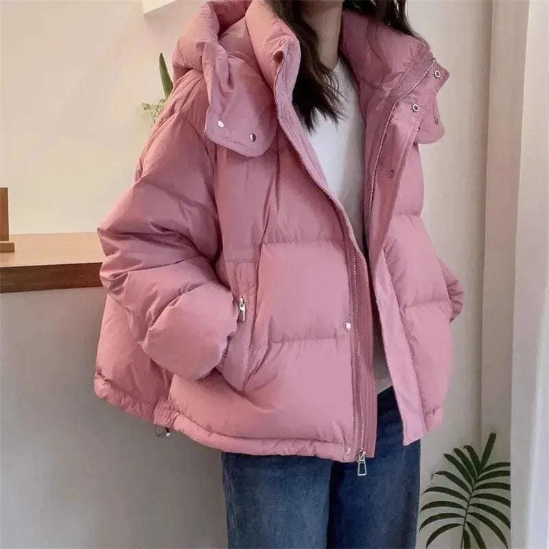 Women's cropped quilted puffer jacket with hood, long sleeves and zip front