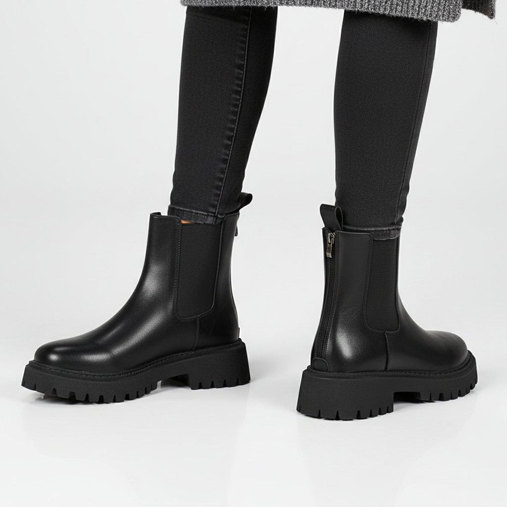Women's Chelsea ankle boots with elastic side panels and chunky lug soles