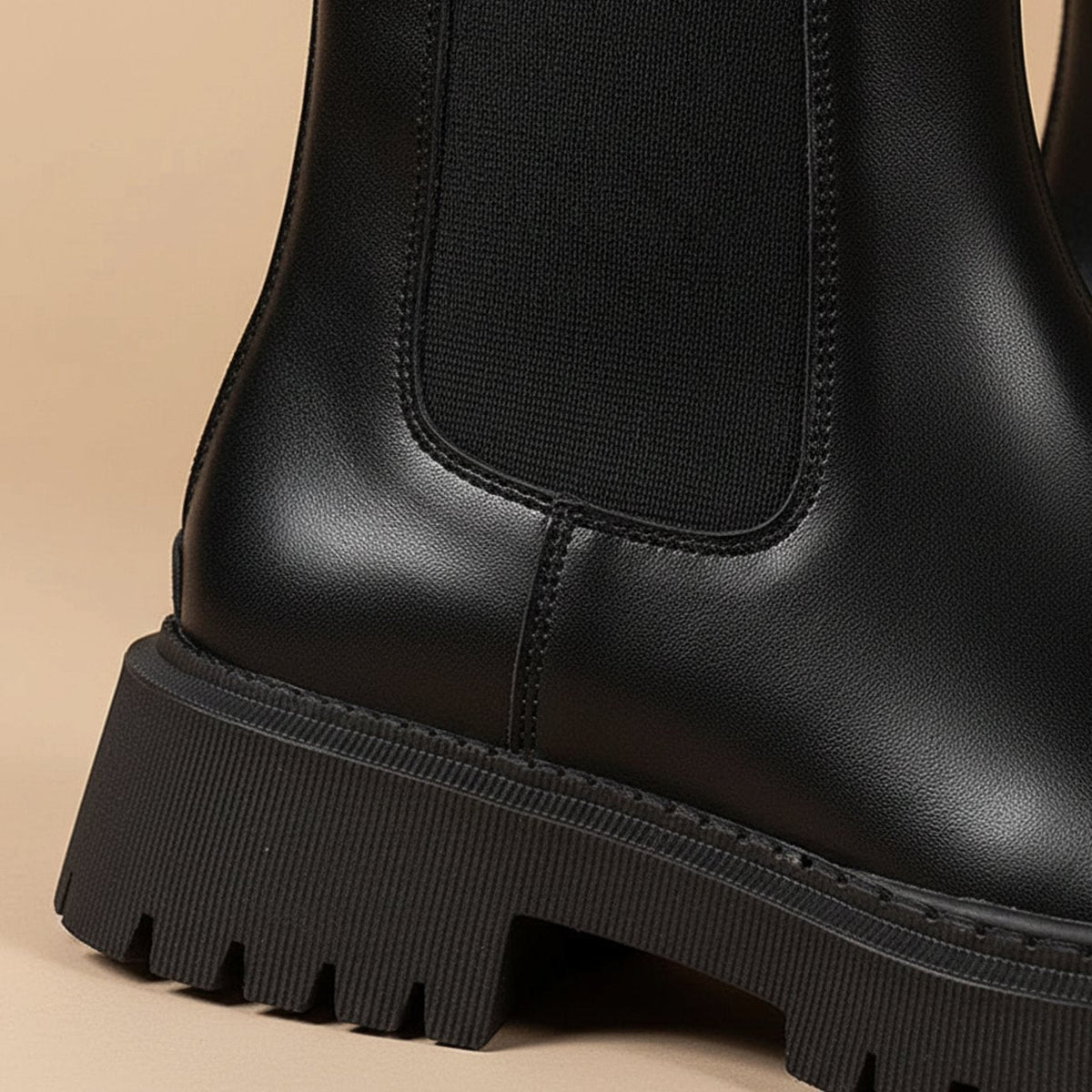 Women's Chelsea ankle boots with elastic side panels and chunky lug soles