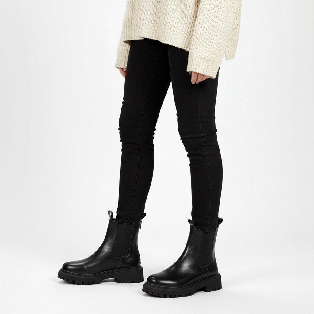 Women's Chelsea ankle boots with elastic side panels and chunky lug soles