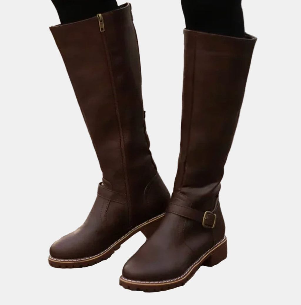 Women's knee high riding boots with ankle buckle strap and low heel