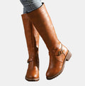 Women's knee high riding boots with ankle buckle strap and low heel