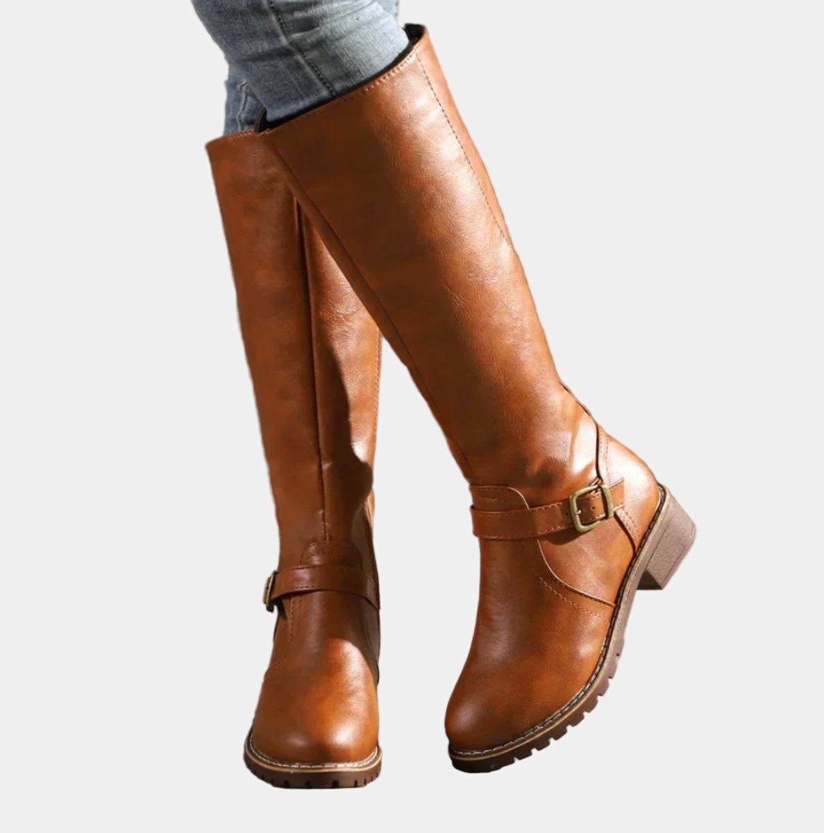 Women's knee high riding boots with ankle buckle strap and low heel